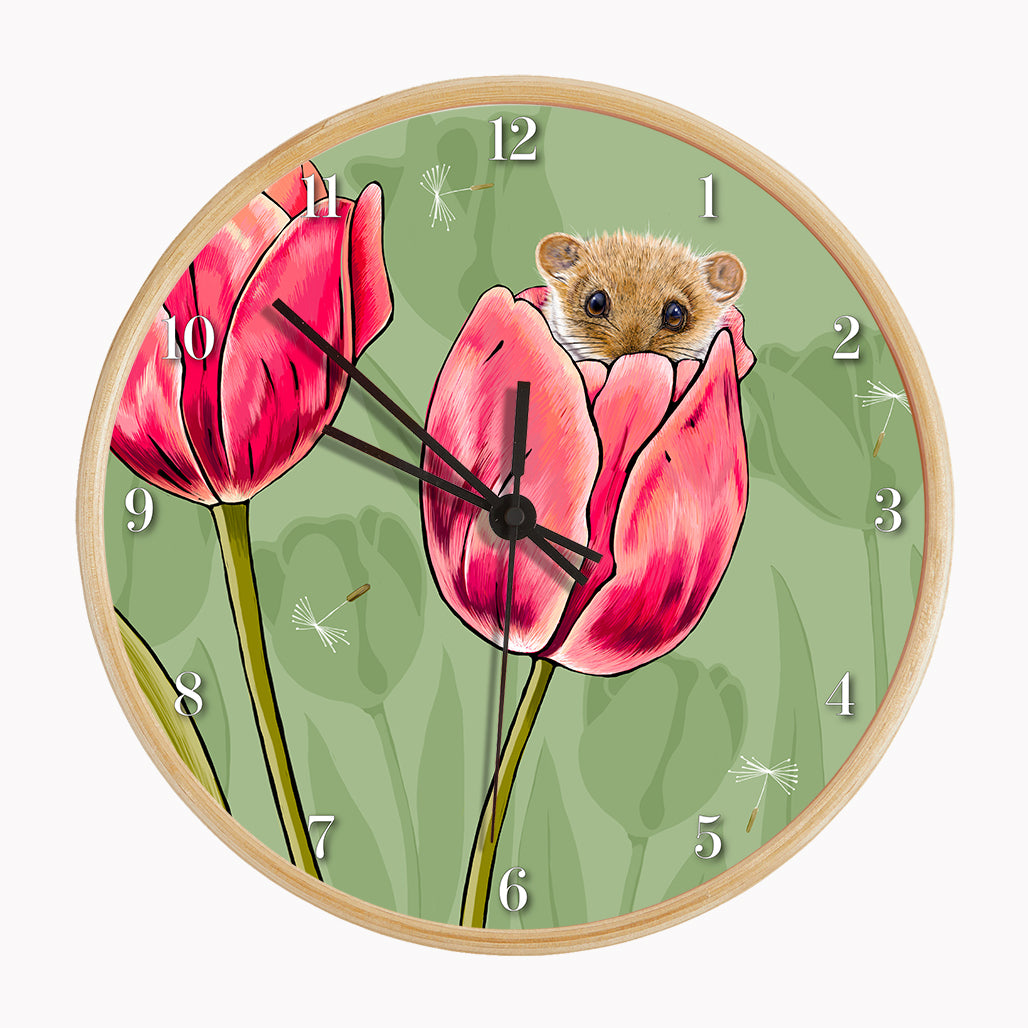 Our sustainable dormouse and tulip wall clock features an illustrated dormouse sitting in a tulip