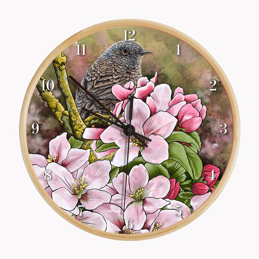 Our sustainable garden bird wall clock features an illustrated Dunnock surrounded by spring blossom