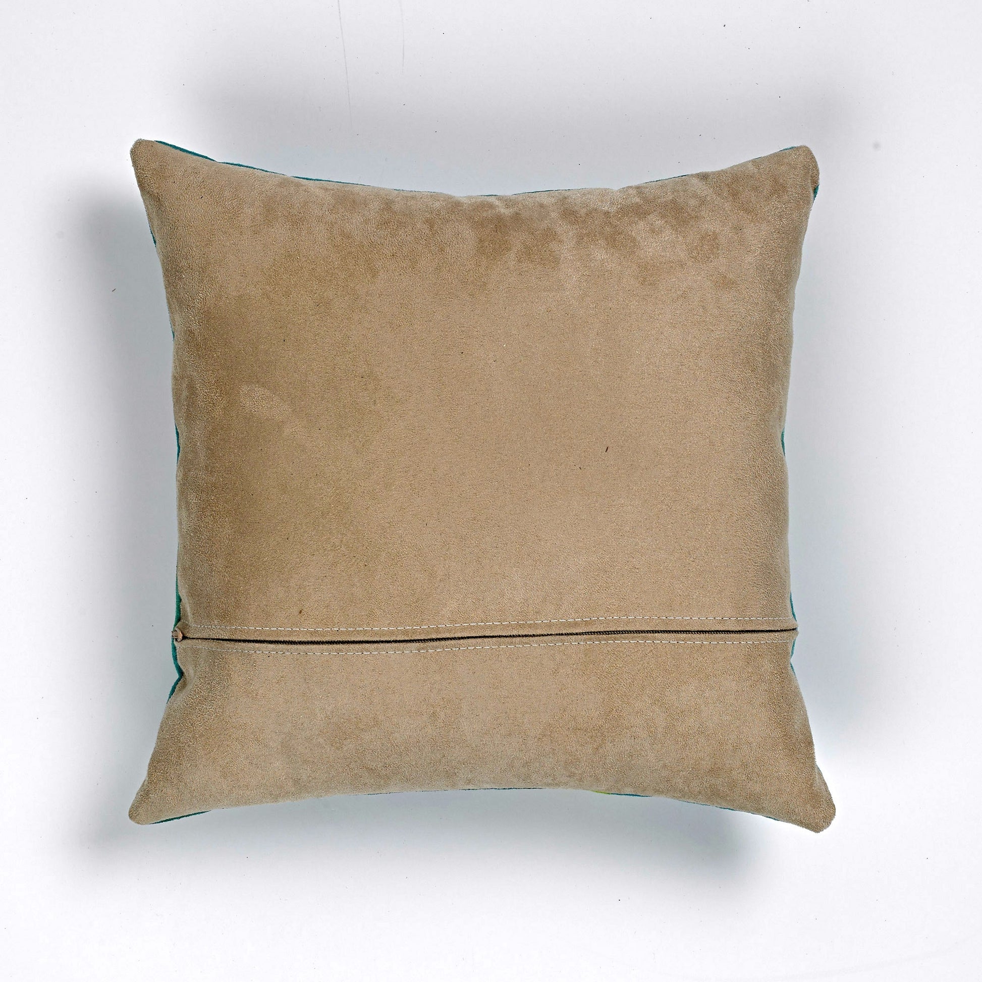 Reverse of faux suede cushion, which is a sort of beige or stone, with zipper for cover removal.