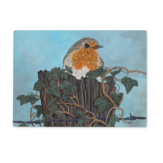 Rectangular Robin Tempered Glass Chopping Board, robin  is perched on a tree stump which is covered in ivy and barbed wire.