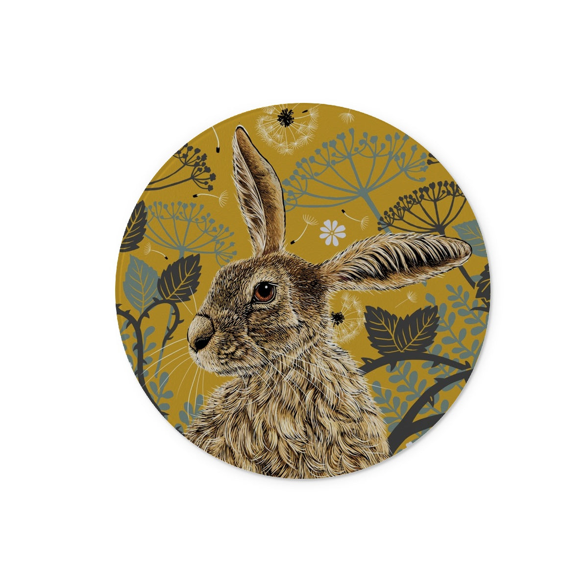 This round hare tempered glass chopping board design features a hare portrait with one floppy ear, around the hare are stylised brambles, leaves, cow parsley and dandelion puffs, background colour is a mustard yellow.