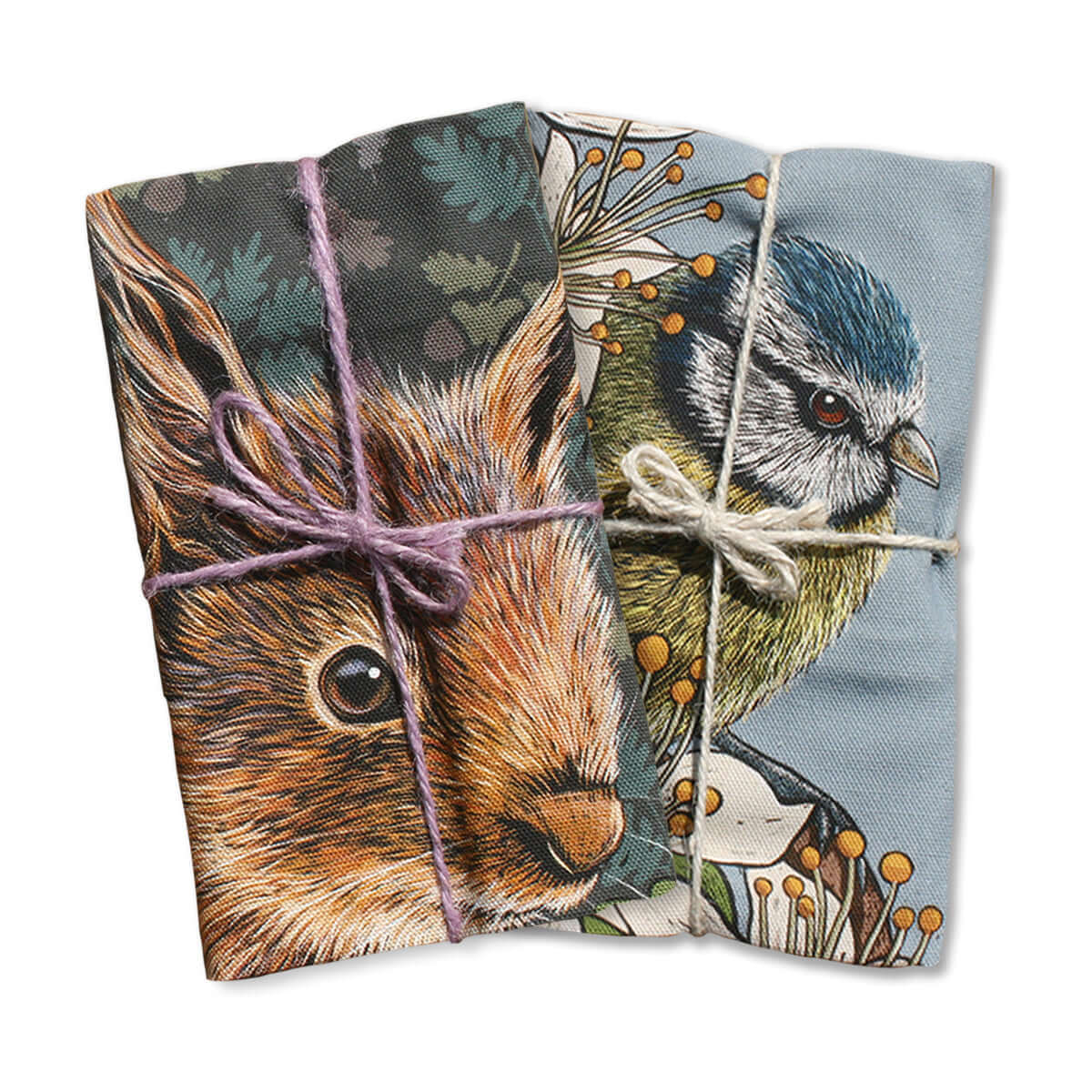 British Made Eco-friendly Tea Towel Collection, Our selection of our beautifully illustrated, ethically produced cotton tea towels; products shown are blue tits and squirrel tea towels, both folded and tied with British made twine.