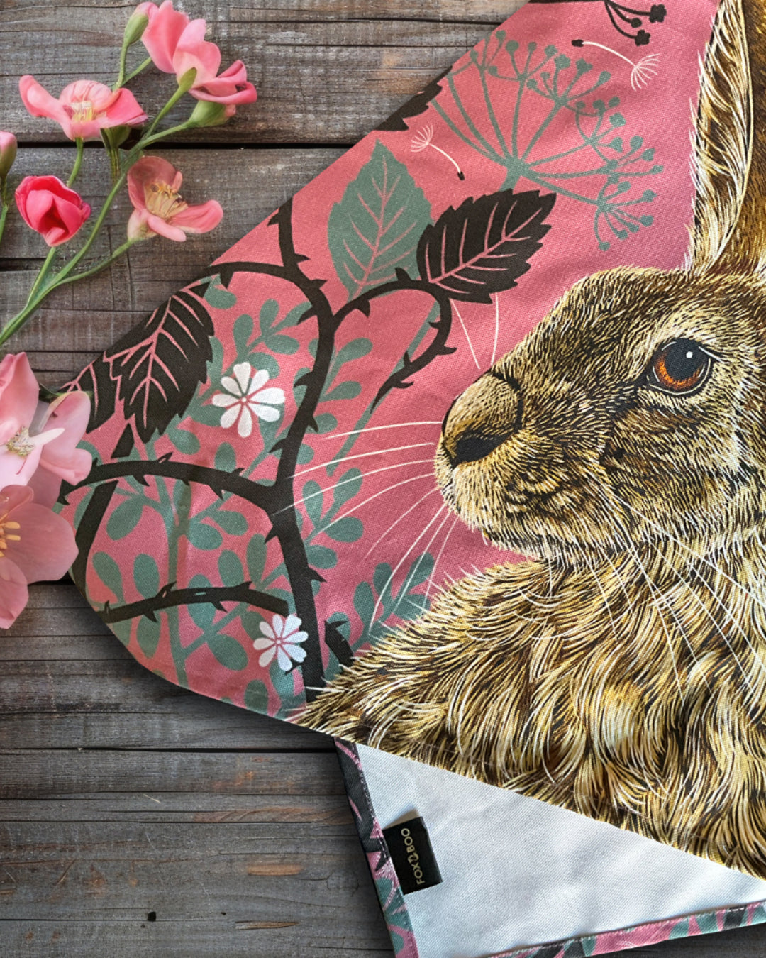 British Made Eco-friendly Tea Towel Collection, Our selection of our beautifully illustrated, ethically produced cotton tea towels; products shown are blue tits and squirrel tea towels, both folded and tied with British made twine.