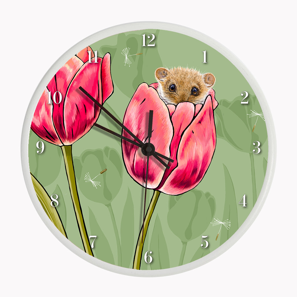 Our sustainable dormouse and tulip wall clock features an illustrated dormouse sitting in a tulip