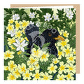 Blackbird and Primrose blank greeting card, blackbird is central to the composition and is surrounded by beautiful yellow Primroses and delicate white Wood Anemone wildflower