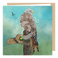 A breathtaking illustration of a red kite, a bird of prey, on this greeting card square high-quality left blank for your own message. The red kite is perched on a way marker sign surrounded by Ivy. The background is fairly simple indicating that the red k