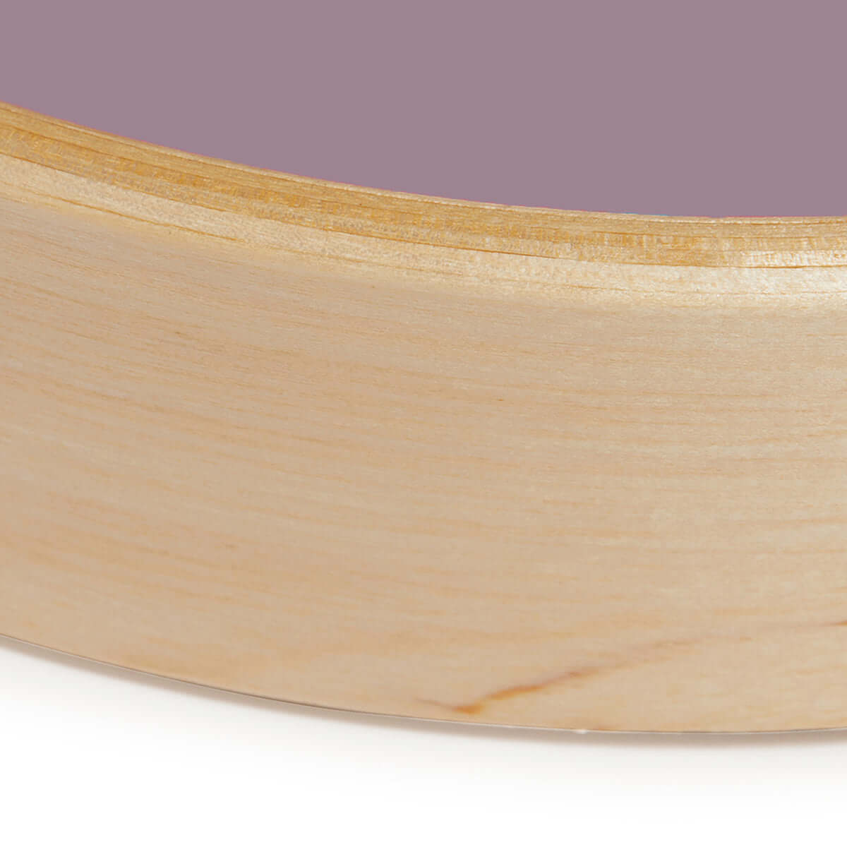 Close up detail of natural bamboo wall clock frame 