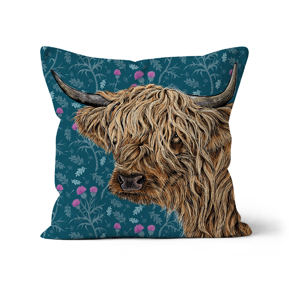 Highland Cow Cushion by Fox & Boo, featuring a highland cow among thistles and oak leaves