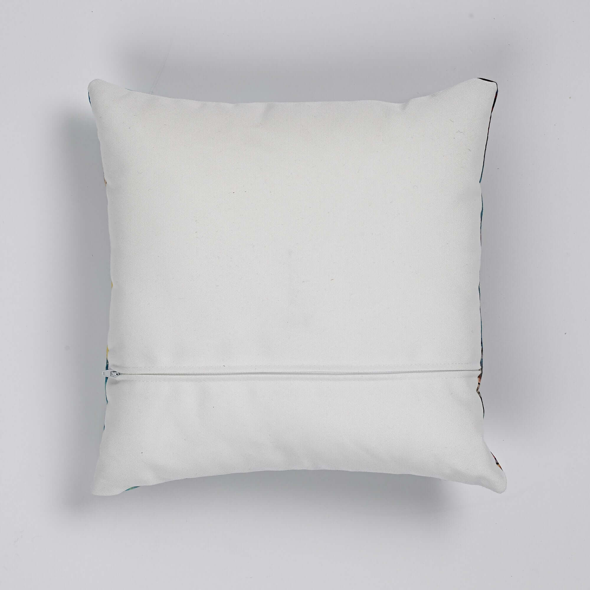 Reverse of faux linen Vintage Style Wren Cushion which is ivory, with zipper for cover removal
