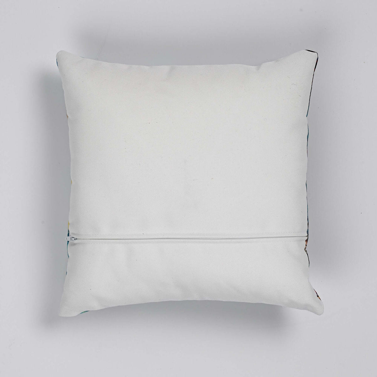 Reverse of faux linen cushions, which is an ivory colour. Complete with zipper for cover removal.